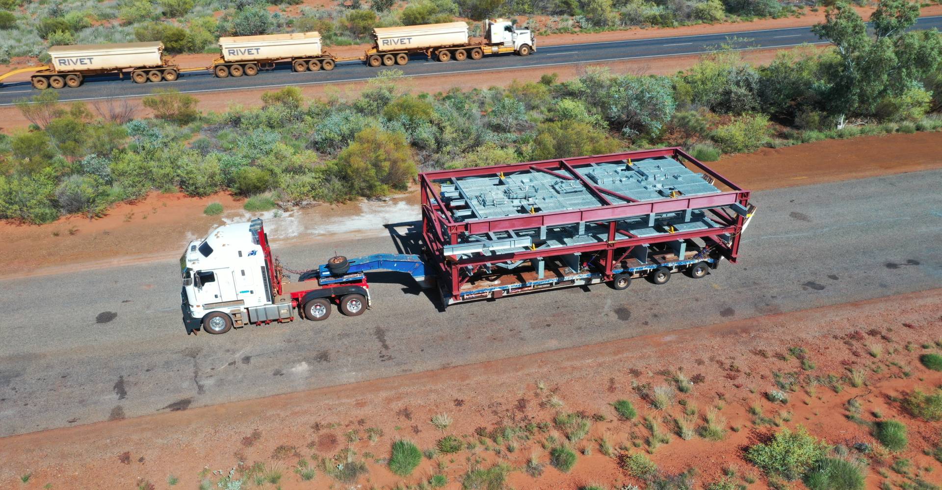 Australia Wide Haulage prime mover transporting a large over-dimensional structure through regional Western Australia