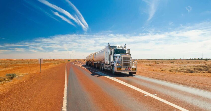 Road Train in outback Australian road that is carrying fuel levy freight